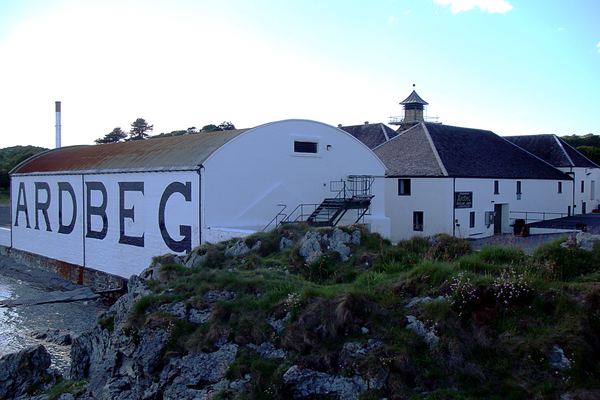 Ardbeg Distillery warehouse with large black lettering on the Islay coast