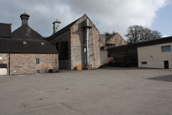Stone buildings and courtyard of The Dalmore Distillery, Alness