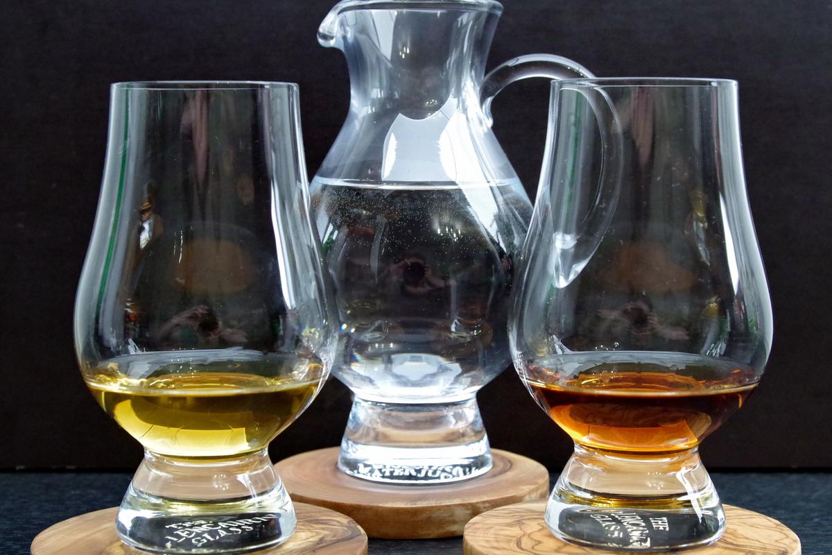 Two Glencairn glasses used to compare different types of whisky side by side