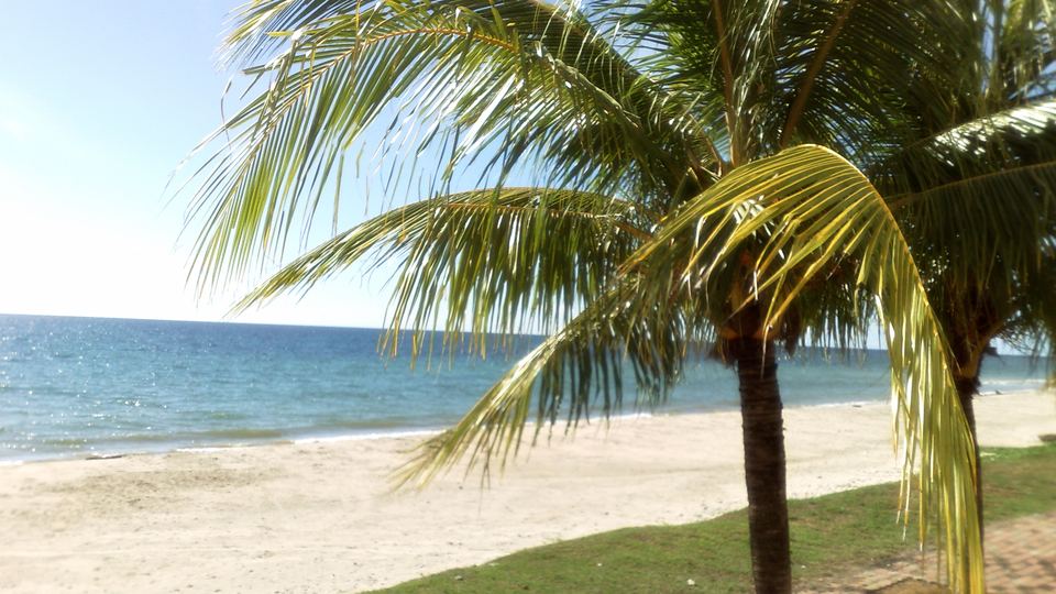 Sandy beach on Labuan island, where visitors buy Labuan duty free whisky